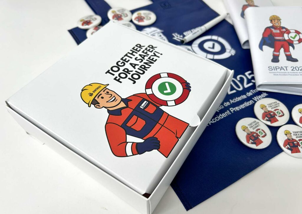 Materiais impressos para SIPAT com cartazes e cadernos personalizados produzidos pela Copy House